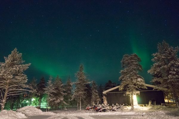 Seeing the Northern Lights just outside our lodge on the first night