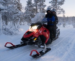 Snowmobiling in the forest